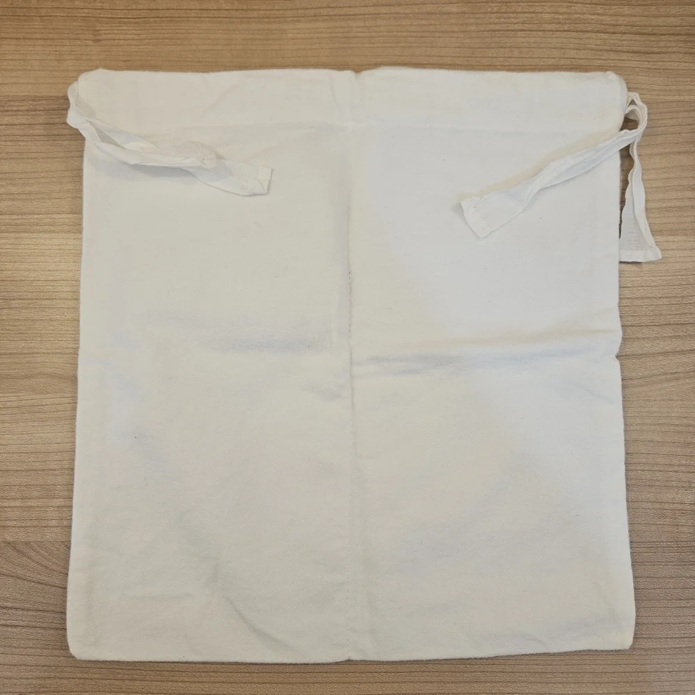 The Row Cream Partitioned Dust Bag